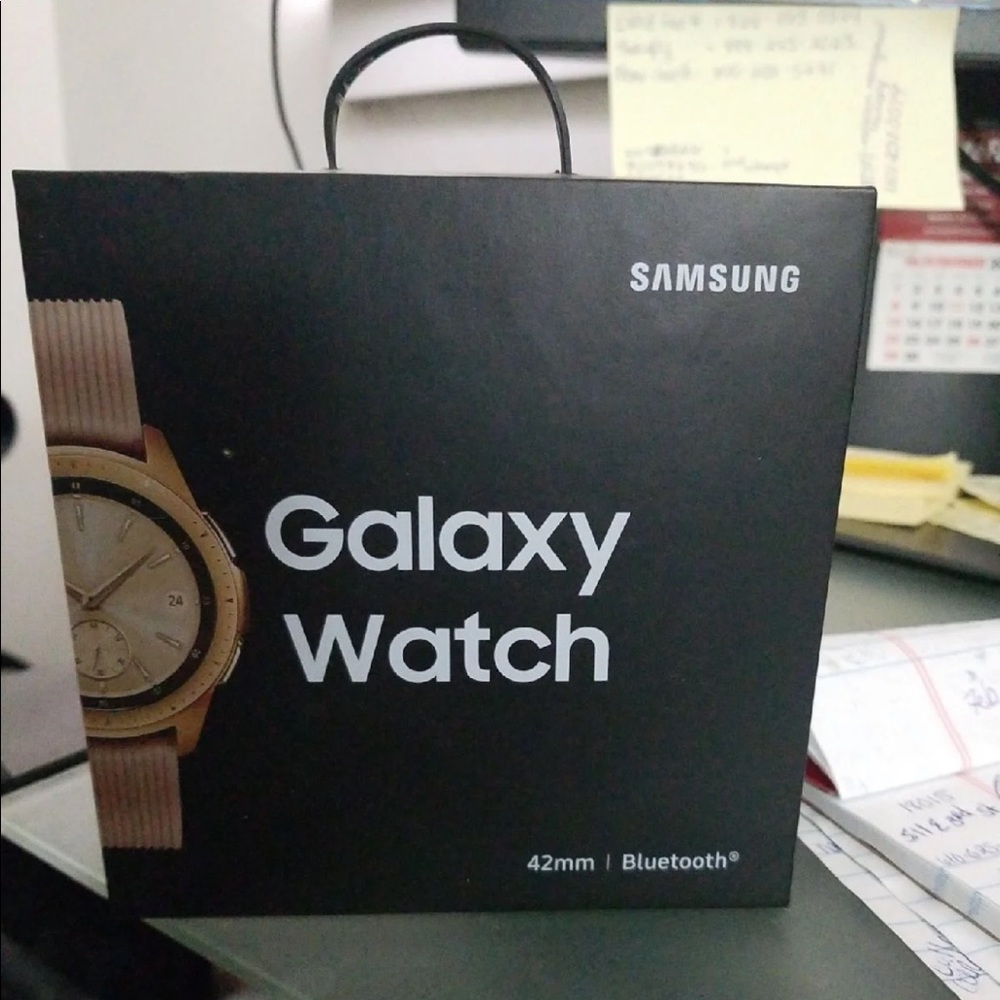 Rose gold galaxy smart watch